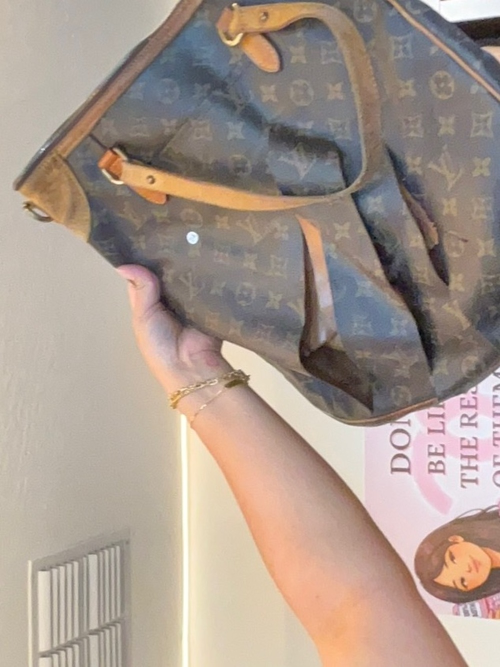 74. lv mono slashed sold as is desc in live no cancel/returns